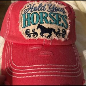 Pink “Hold your Horses” ball cap.